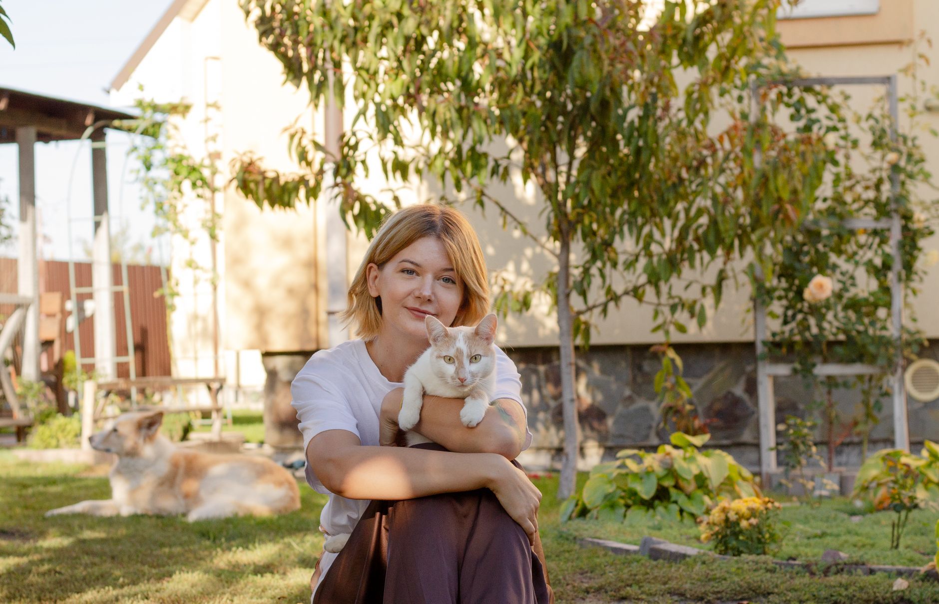 Pet parent relaxing at home with a pet